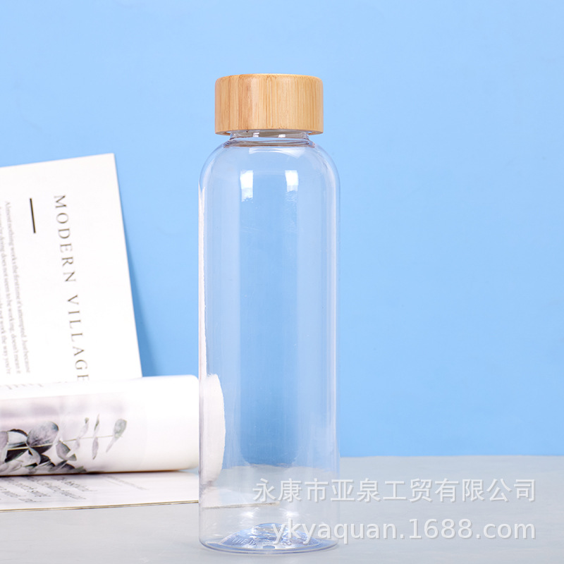 Suministro directo de fábrica Taza de vidrio con tapa de bambú transparente Taza de agua de vidrio de té de oficina de gran capacidad Taza de plástico transparente al por mayor