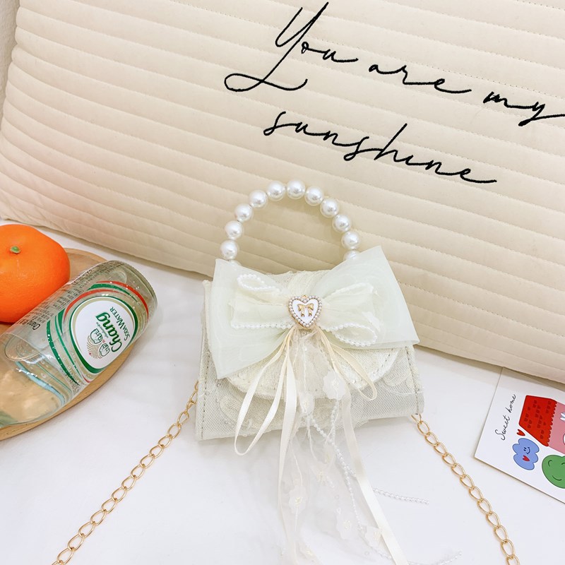 Lindo bolso de cadena de niña de estilo princesa, bolso de bebé de amor con lazo, bolso de niño de encaje con fragancia pequeña