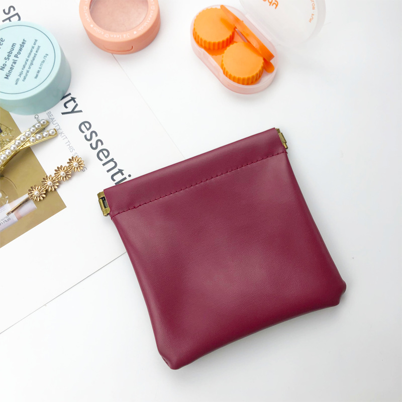 Venta al por mayor de cuero servilleta sanitaria lápiz labial bolsa de almacenamiento de metralla bolsa de almacenamiento mini ins estilo pu cuero pequeño monedero