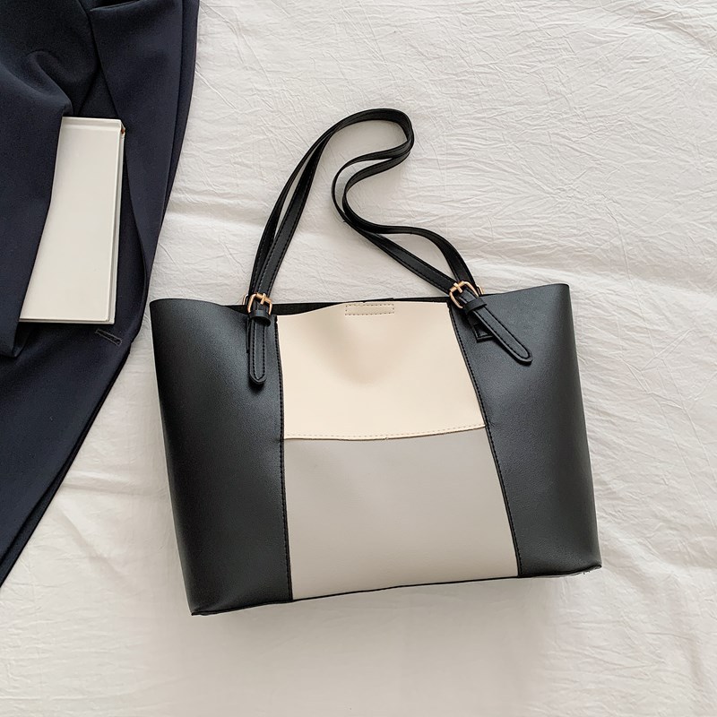 Bolso de cercanías atmosférico para mujer, estilo occidental de gran capacidad 2025 verano nuevo estilo retro simple bolso portátil de un solo hombro para mujer