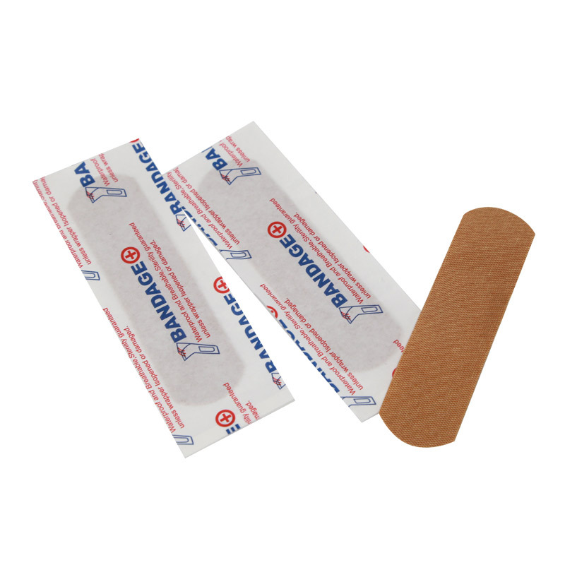 Comercio exterior transfronterizo Inglés pegamento de algodón color de piel elástico pegamento hemostático impermeable pegamento permeable vendaje de heridas pequeñas