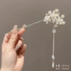 Golden Chinese hairpin pearl with tassels