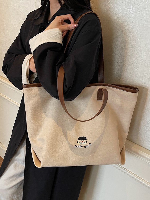 Bolsa de lona de gran capacidad para mujeres 2025 nuevo estilo urbano simple de viaje al trabajo sensación de alta calidad de moda versátil bolso de mano