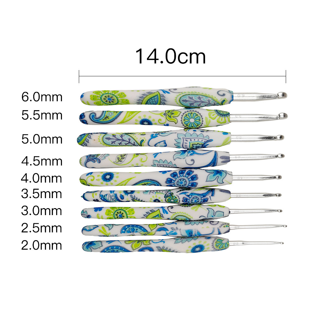 Herramientas de tejer transfronterizas TPR mango suave impresión crochet Flor de anacardo crochet conjunto de 9 piezas traje Pu bolsa