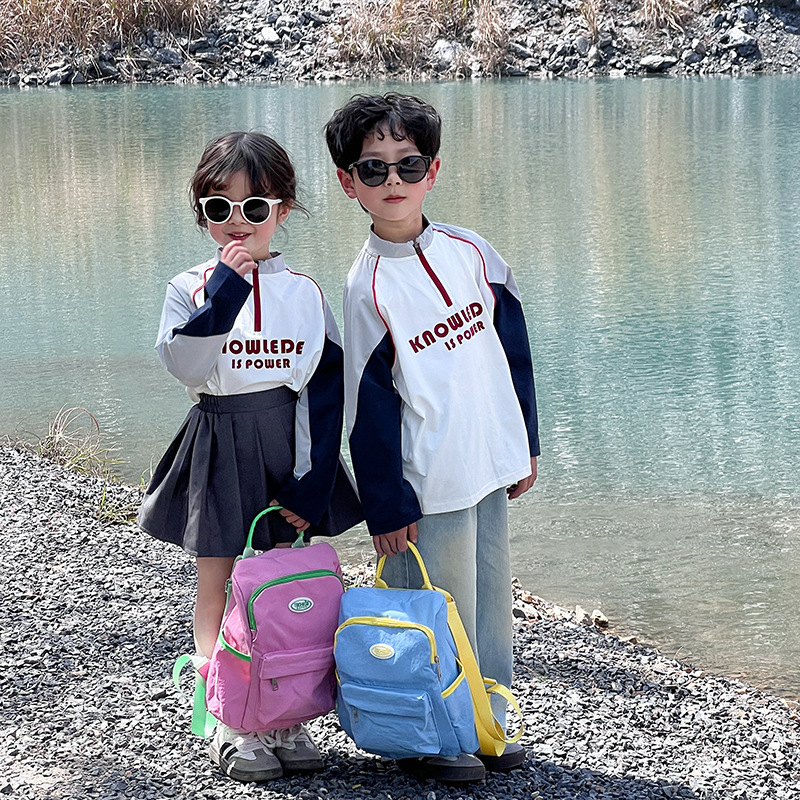 Mochila casual y sencilla para niños y niñas, estilo occidental, lindo color caramelo, mochila escolar para estudiantes de escuela primaria, nueva mochila para niños transfronteriza
