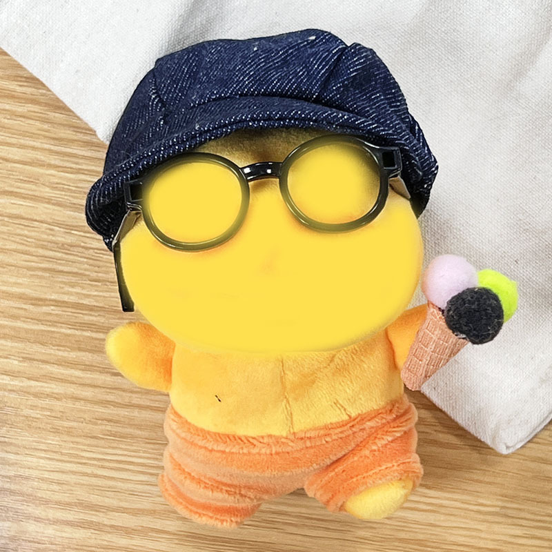 Black-rimmed glasses + cowboy hat (doll not included)