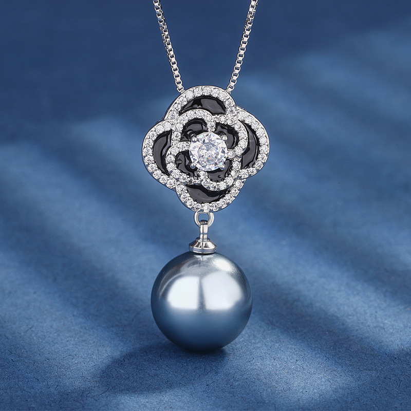 2024 nuevo estilo Zhuang Shengsheng joyería fondo de cobre chapado en oro con incrustaciones de perlas temperamento camelia traje femenino 16-14mm