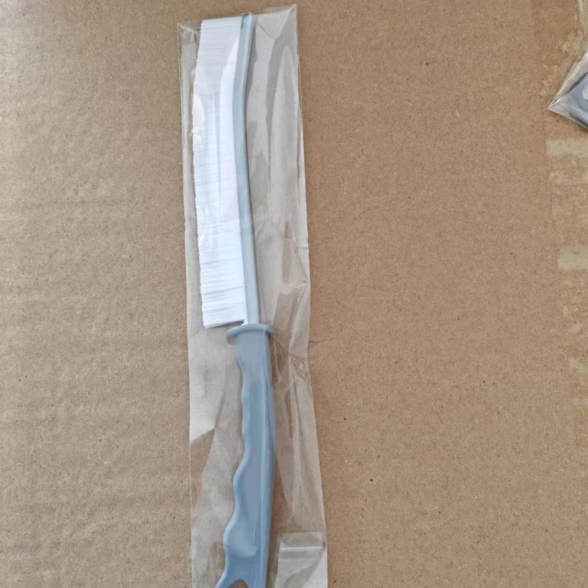 흰머리가 있는 회색손잡이(OPP포장)