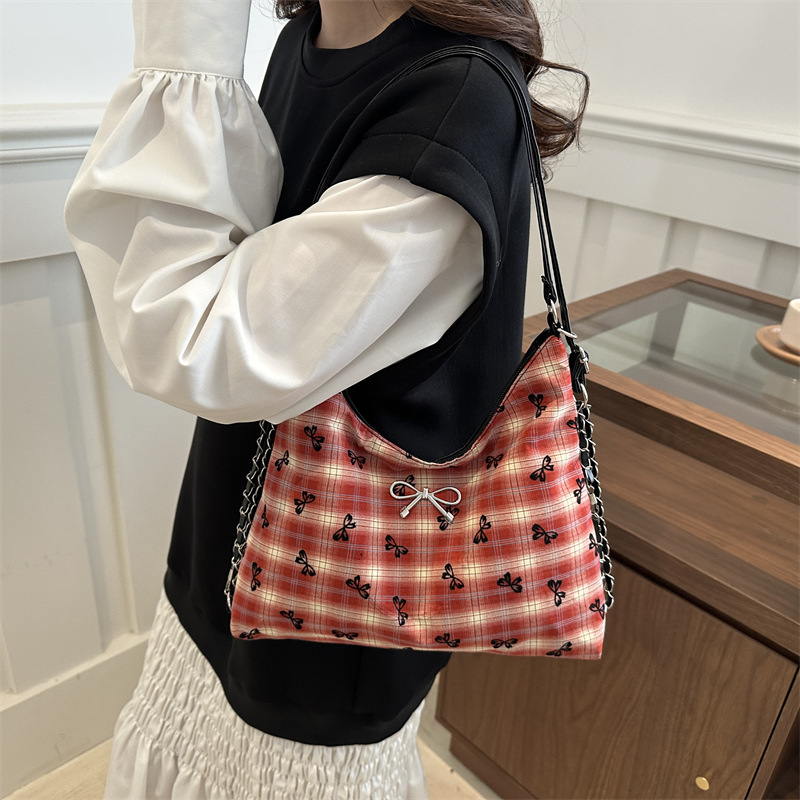 Bolso de mujer nicho de alta sensación de verano bolso de hombro bajo la axila nuevo punto de onda impresión bolso especial mochila casual