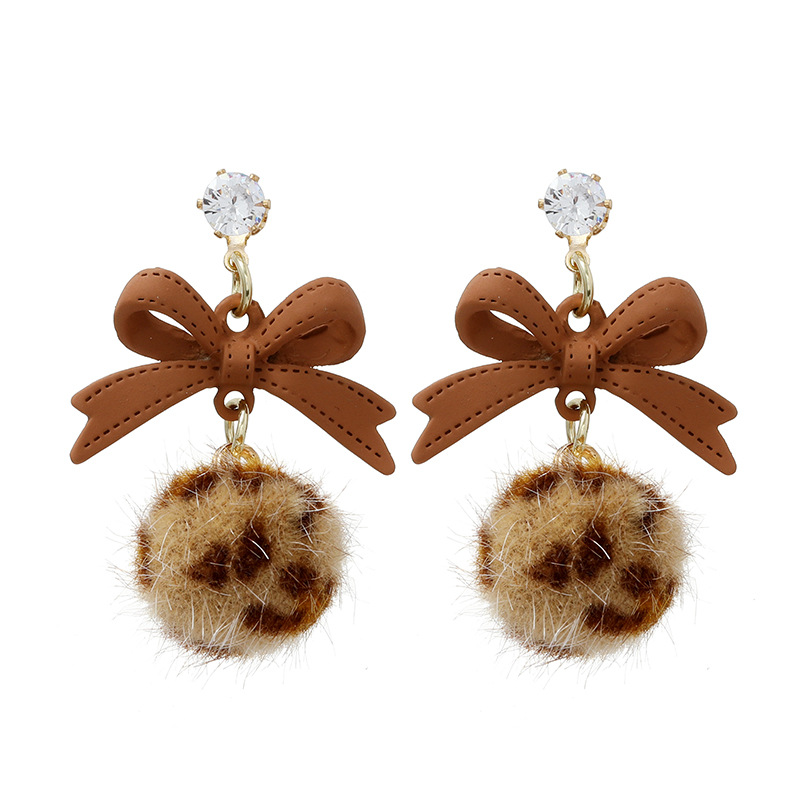 Korean Version Of The Fashion Autumn And Winter New Bow Leopard Hair Ball Earrings Simple Retro Niche Creative Earrings display picture 1