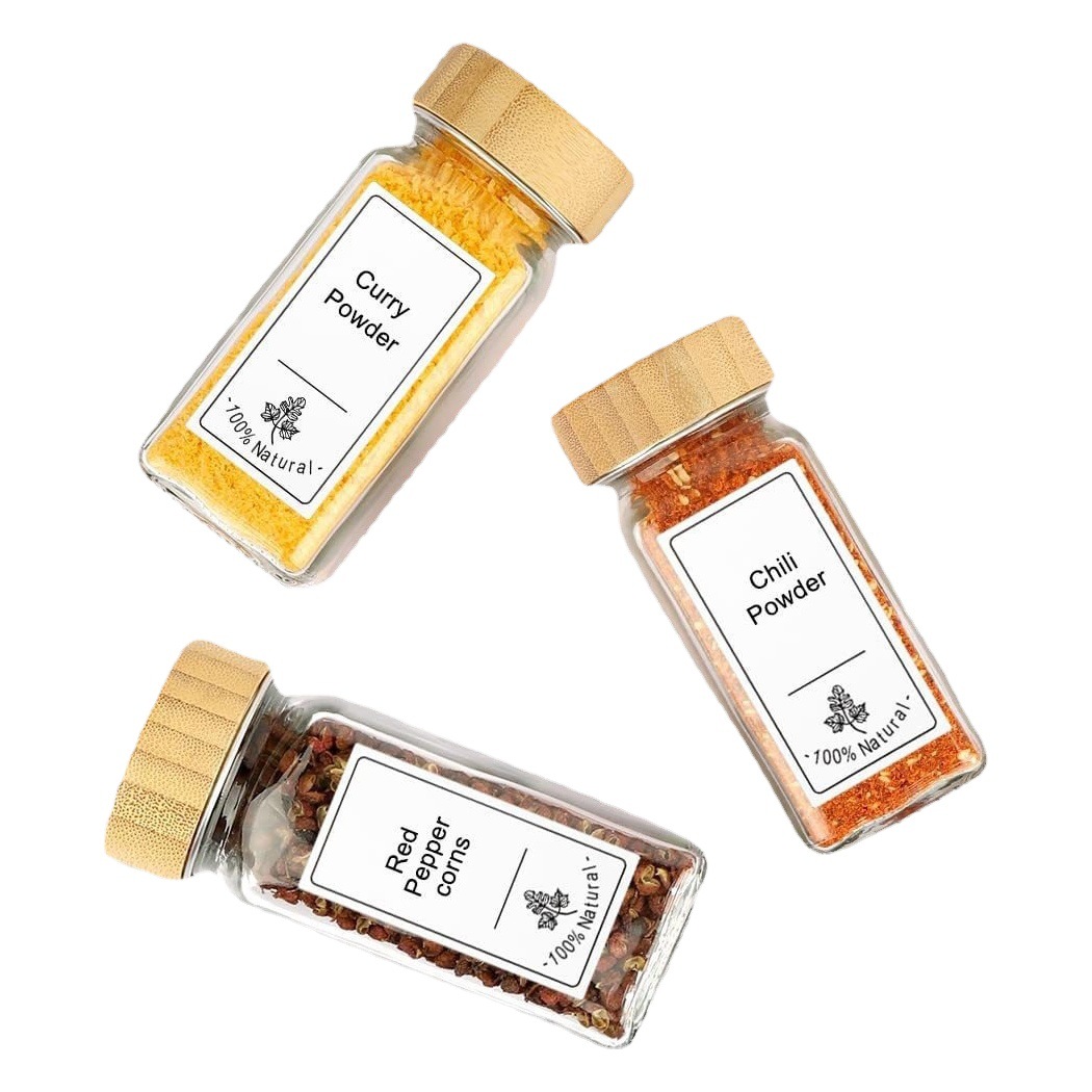 Venta caliente de Amazon 120ml botella de condimento de vidrio con tapa de madera de bambú 4oz tarro de condimento cuadrado botella de vidrio embalaje de algodón perlado