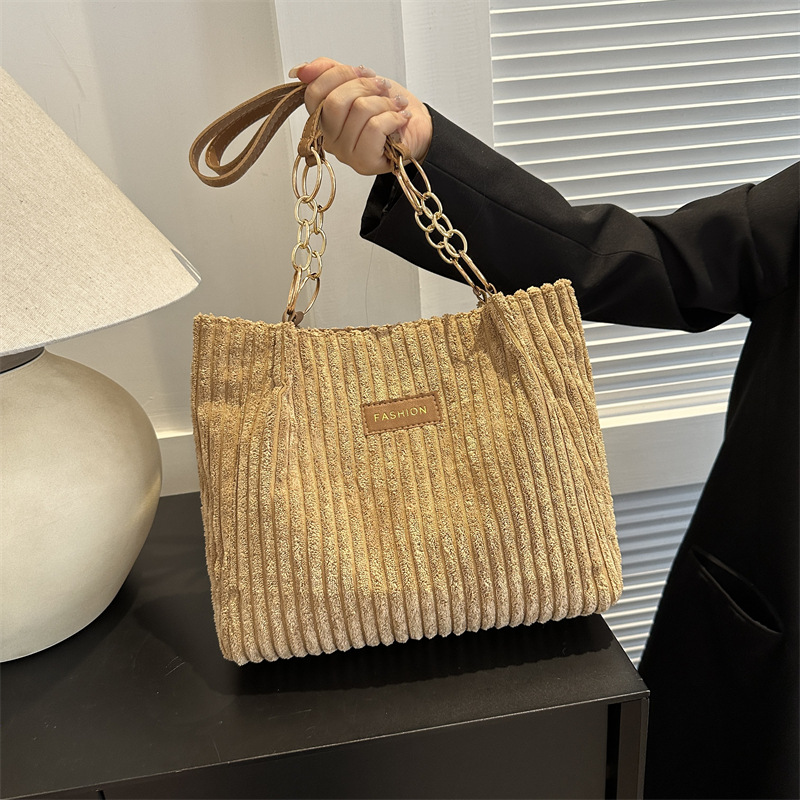 Otoño e invierno bolsa de gran capacidad para mujeres 2024 nuevo popular bolsa de hombro de camellia de viaje bolso de brazo portátil