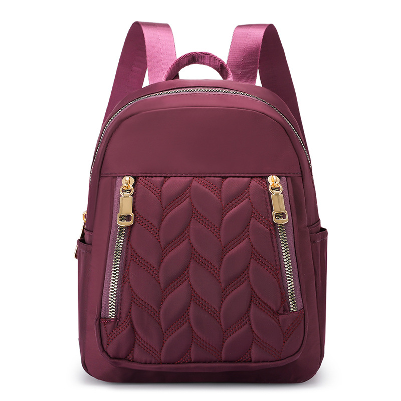 Mochila de moda transfronteriza para mujer, nueva mochila casual de rombo simple, bolsa de tela de color sólido de tendencia coreana al por mayor