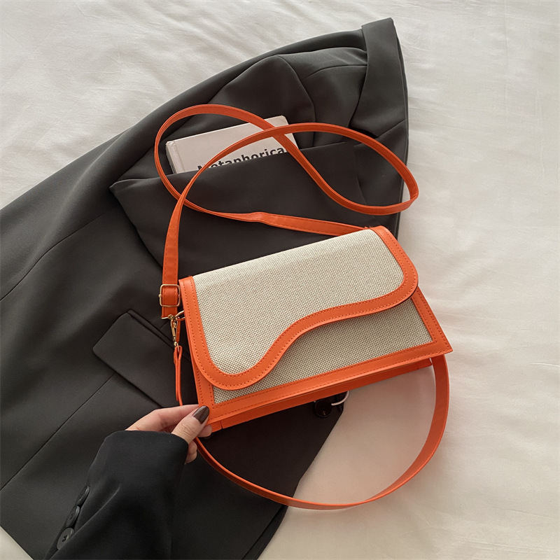 Bolsos populares de este año para mujer 2024 nuevo bolso de mensajero de un solo hombro con costuras de color en contraste de moda bolso cuadrado pequeño portátil