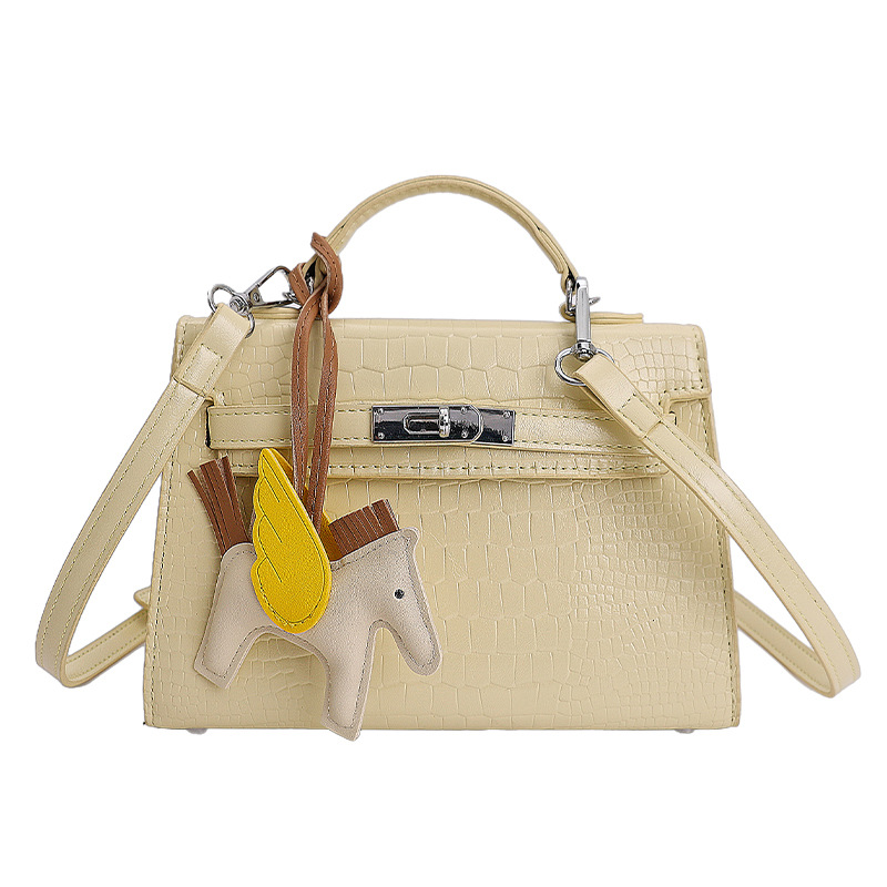 Nicho popular cocodrilo portátil bolso Kelly mujer 2026 nueva moda versátil alta sensación de hombro mochila