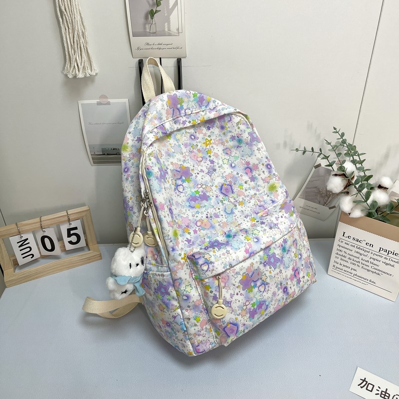 Mochila de estudiantes de alto valor de diseño de tendencia impresa de gran capacidad mochila de flores pequeñas estrellas mochila para mujeres image 10