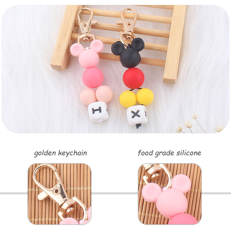 Creativo DIY nueva historieta cuentas pequeño colgante contraste color silicona cuentas llavero colgante bolsa pequeño colgante AliExpress