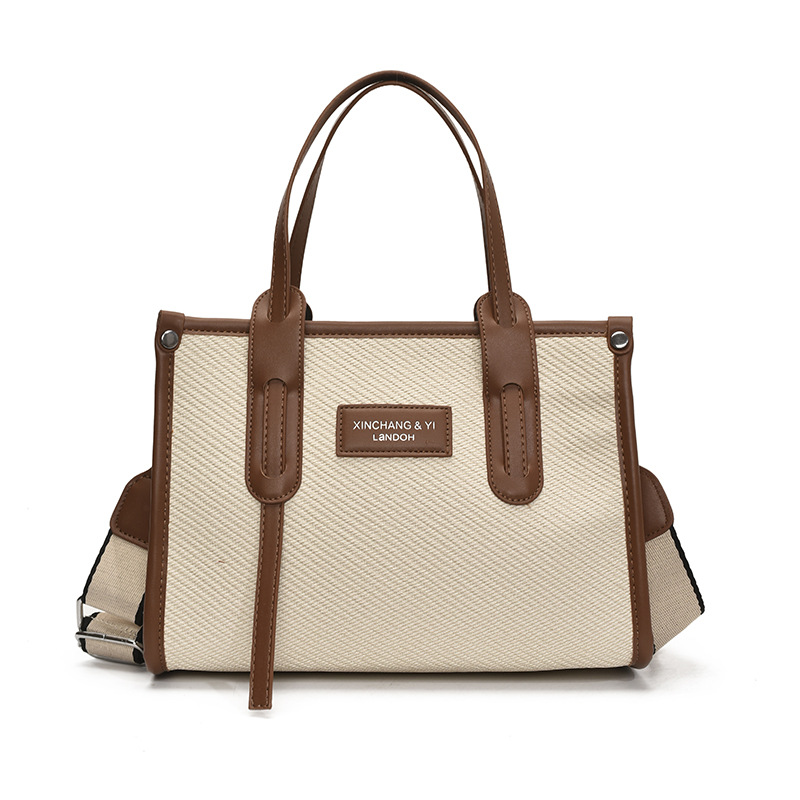 Bolso de gran capacidad para mujer 2025 verano nuevo estilo moda contraste color costura mensajero bolso simple de viaje