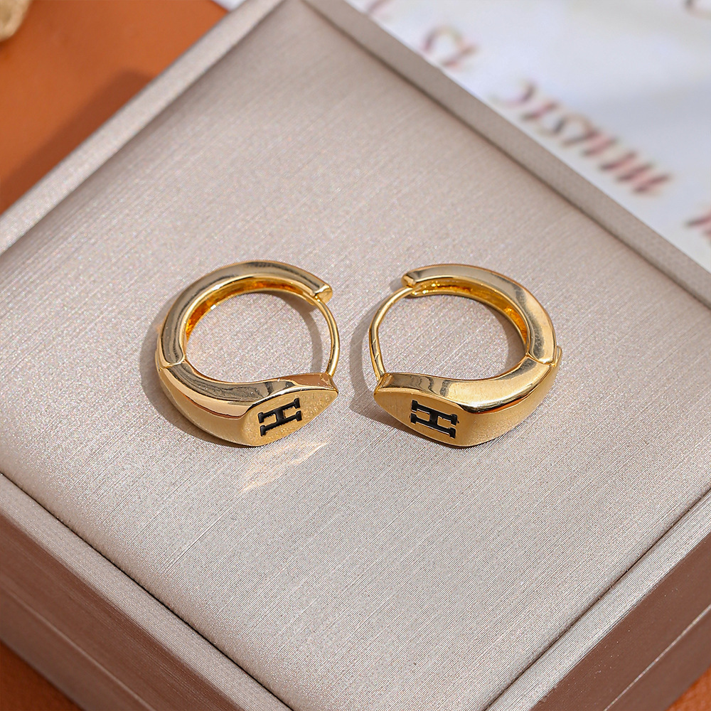Copper golden fashionable elegant small design universal earrings…