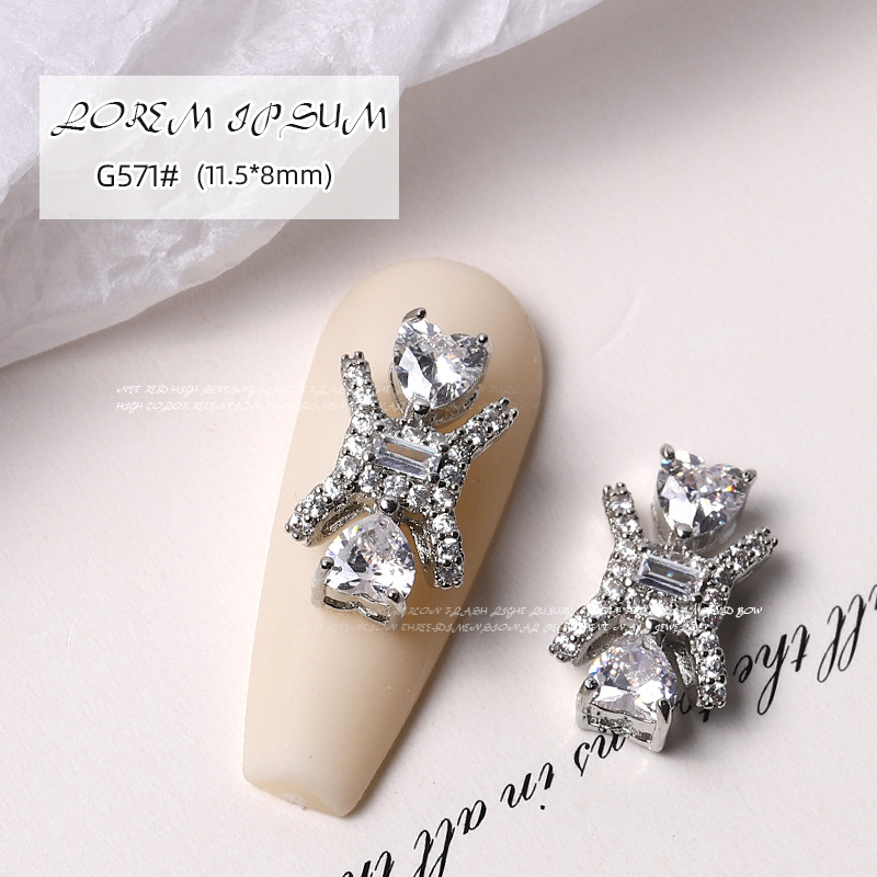 Nueva celebridad de internet luz de lujo circón amor super flash perla mariposa colgante cadena de uñas estrella de plata diamante conejo pequeño diamante image 17