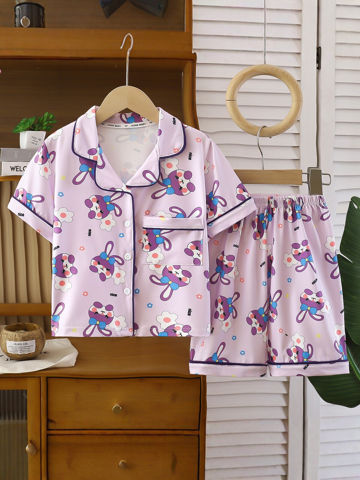 Niños de verano nuevo dibujos animados mangas cortas ropa de vestir para el hogar, hombres y mujeres con solapa ropa de aire acondicionado, pijamas delgados impresión