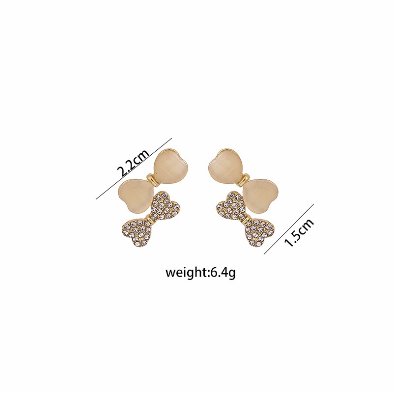 Simple Style Bow Knot Alloy Inlay Rhinestone Earrings display picture 1