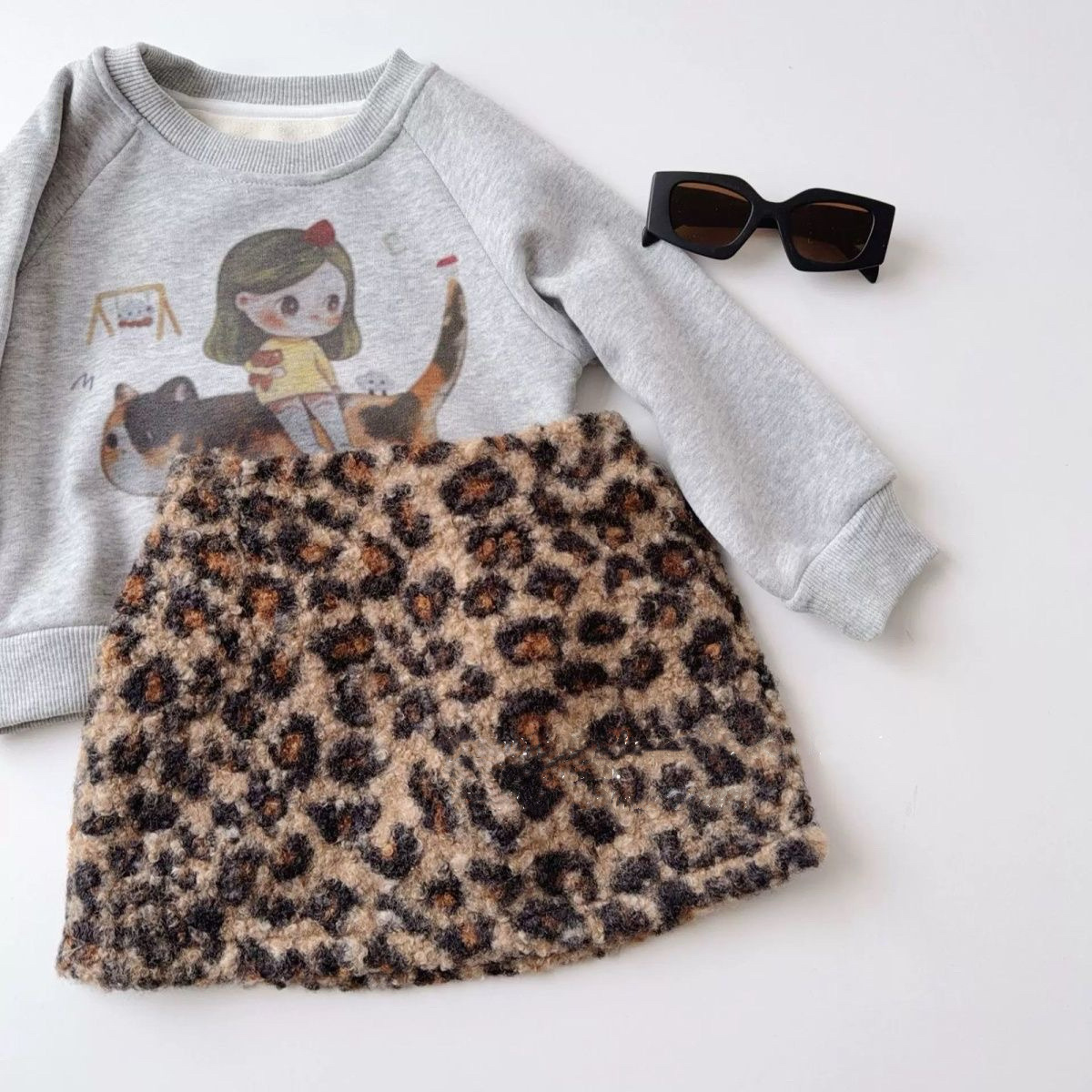 Niños coreanos falda 25 otoño y invierno mujeres tesoro grueso calentamiento piel leopardo falda corta de moda de niñas una falda image 1