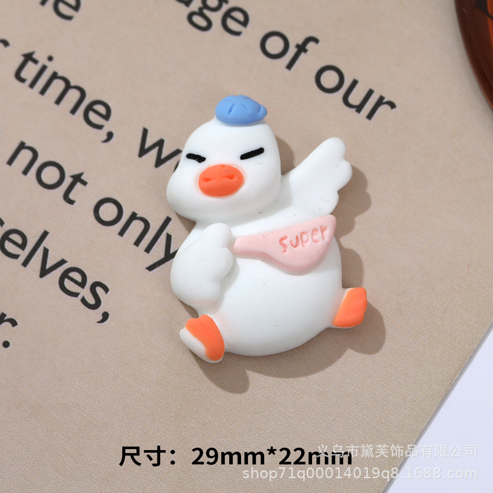 Sombrero de paja al por mayor de pato de celebridad de Internet de dibujos animados de cabeza torcida DIY accesorios de resina teléfono móvil Shell accesorios para el cabello agujero hebilla de zapato