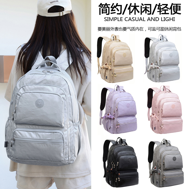 Nueva Mochila De tela impermeable pequeño mono colgante multi-compartimiento Mochila GRANDE mochila de viaje para estudiantes masculinos y femeninos