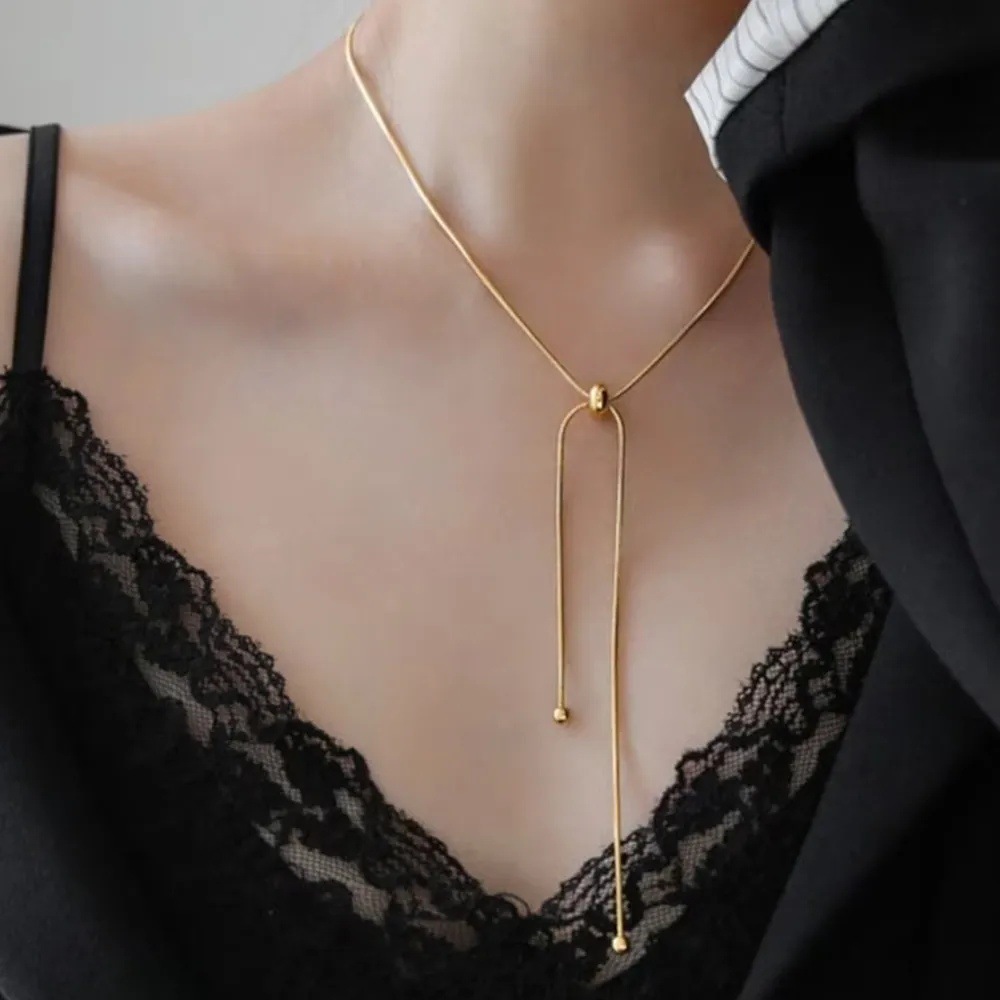 Coreano simple pulsera de tracción de hueso de serpiente ajustable corta y larga pulsera de tobillas de chicas estudiantes en el conjunto de collar de tobillas