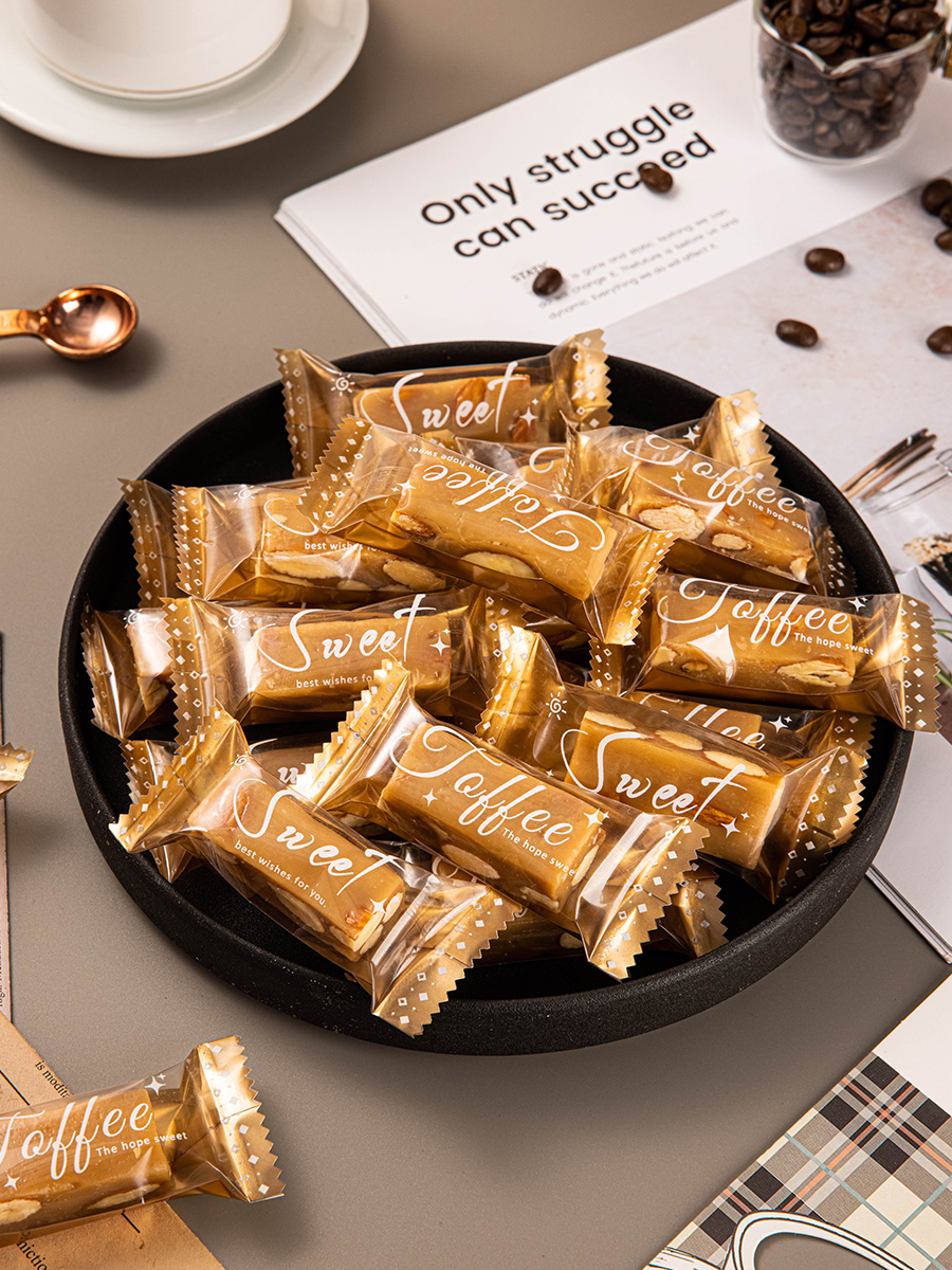 Nueva bolsa de embalaje transparente simple de caramelo de toffee nougat bolsas de sello de máquina de azúcar de café bolsas de sello de nieve crisp bolsas de sello independientes