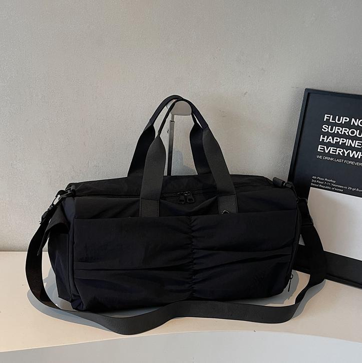 Bolso deportivo coreano transfronterizo femenino 2025 nueva bolsa de almacenamiento separada seca y húmeda bolsa de viaje de viaje