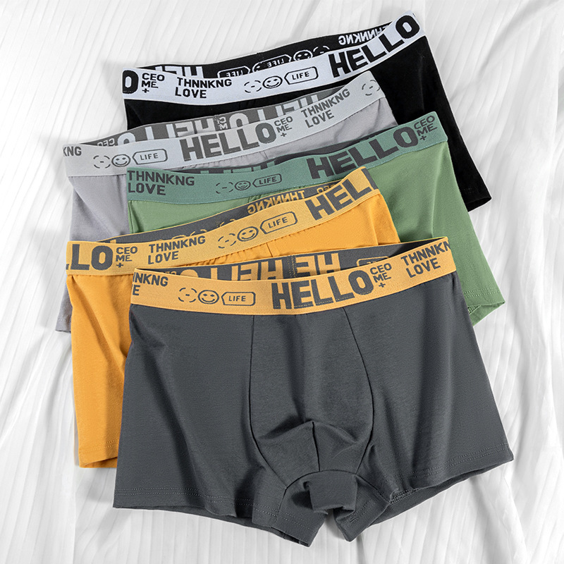 Ropa interior masculina, letras juveniles, cintura media suelta y cómoda, transpirable y sin costuras, pantalones cortos de cuatro esquinas para estudiantes al por mayor