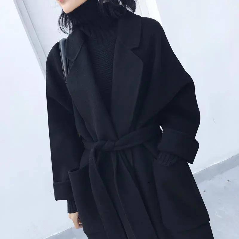 2023冬のウエストベルトの中の長さのウインドブレーカーのフランス式のヘボン風のコートの女性はゆったりとしています。|undefined
