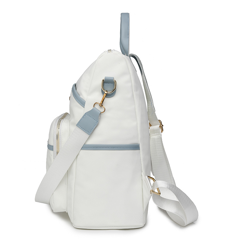 Mochila para mujer Mochila multiusos simple de gran capacidad Color sólido Moda ligera Bolsa de cuero de viaje al por mayor