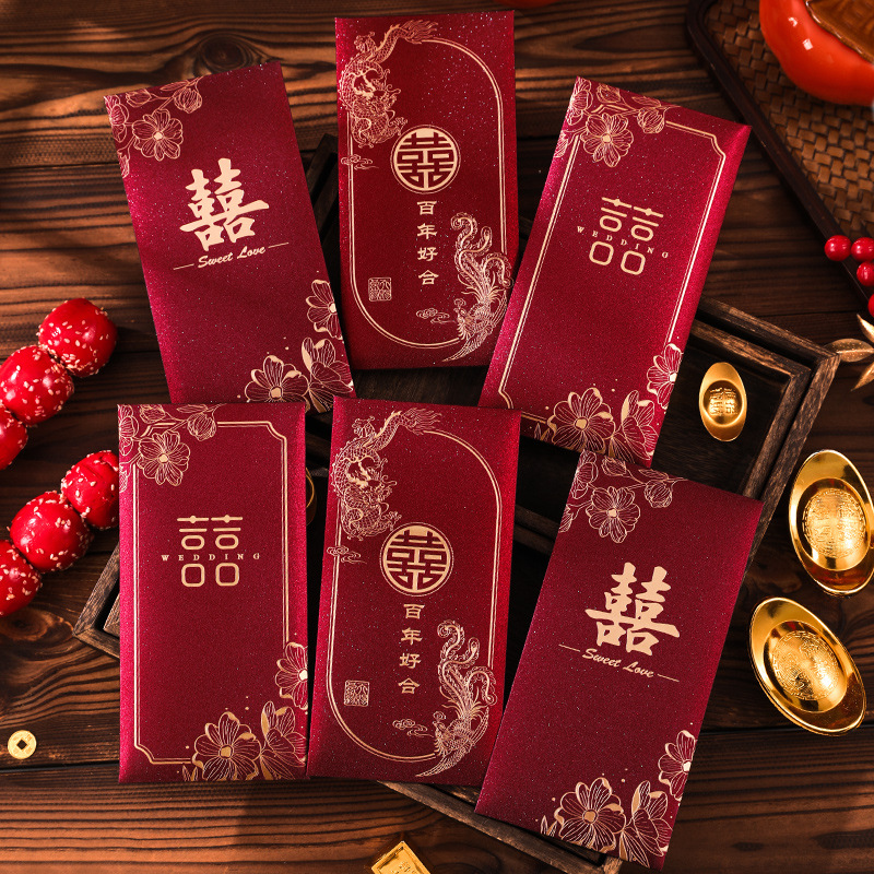 Nuevos artículos de boda, paquetes rojos de cebolla dorada con regalo, beneficios de boda, un sello creativo de miles de yuanes.