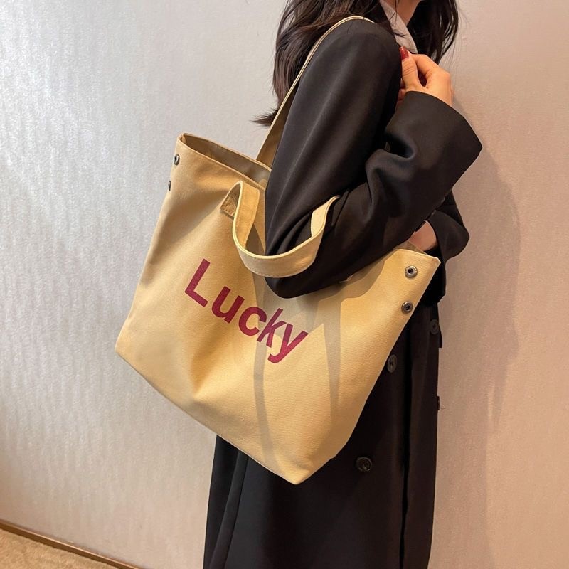 2023 nuevo estilo coreano clásico letras simple bolso de hombro estilo académico bolso casual de gran capacidad