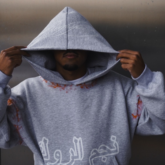 Europa y Estados Unidos explotaron transfronterizos personales calle gris impresión pantalones casuales sueltos de doble cintura pantalones con sudadera con capuz