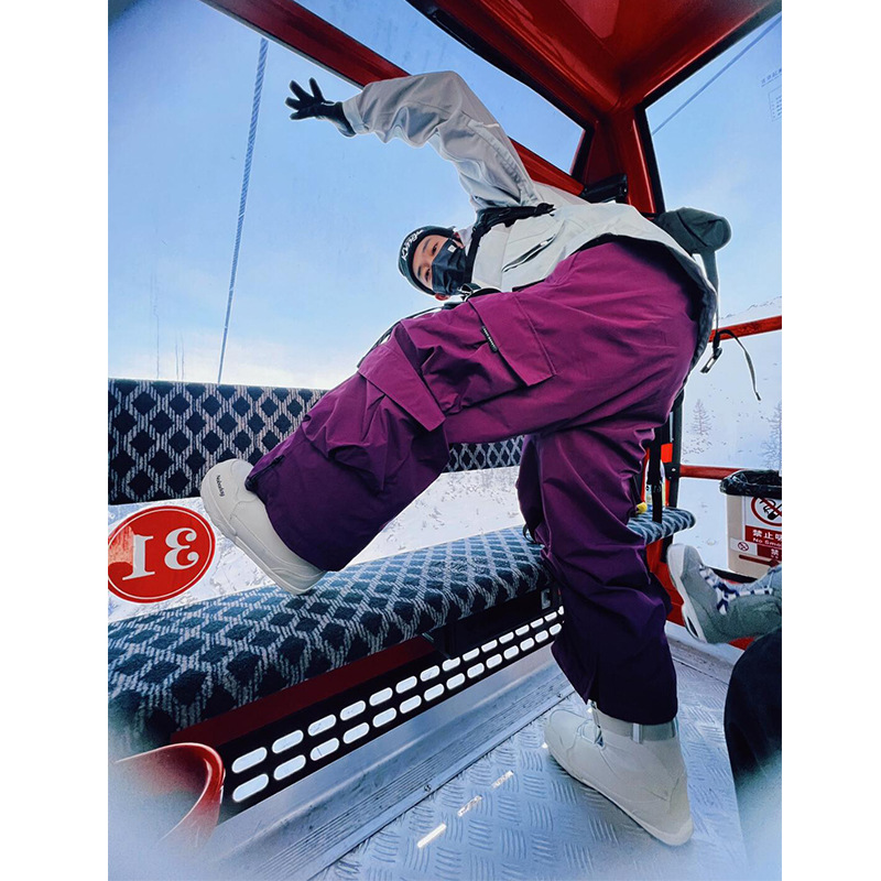 남성과 여성을위한 겨울 하얼빈 스키 겉옷 바지 캐주얼 작업복 대형 포켓 방풍 및 방수 스노우 보드 바지