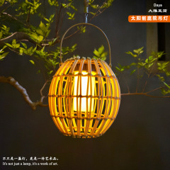 太陽エネルギーは藤編み提灯のレトロな花園の装飾の雰囲気をまねます。