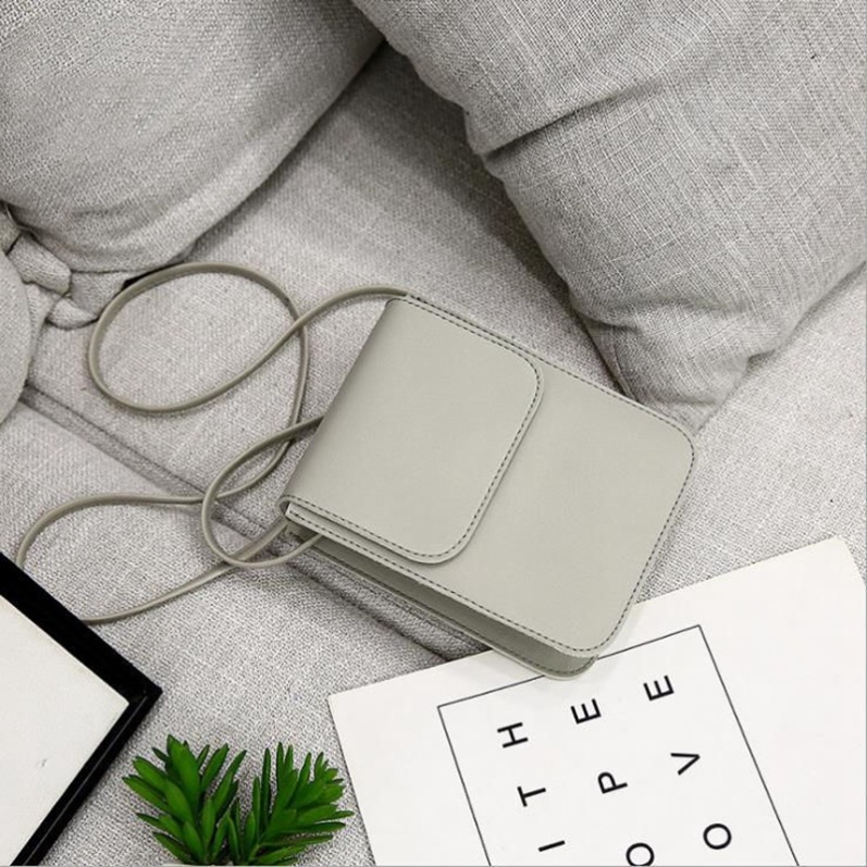 Pequeña bolsa exquisita bolsa de mensajero 2023 nueva bolsa de hombro pequeña bolsa de teléfono móvil vertical femenina mini celebridad Internet pequeña bolsa