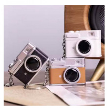 011发光迷你相机钥匙扣皮包挂件可发声复古仿真相机玩偶扭蛋机勇