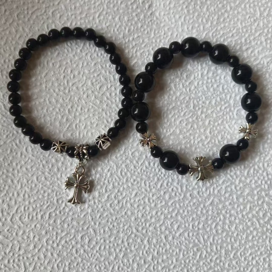 Black cross pendant