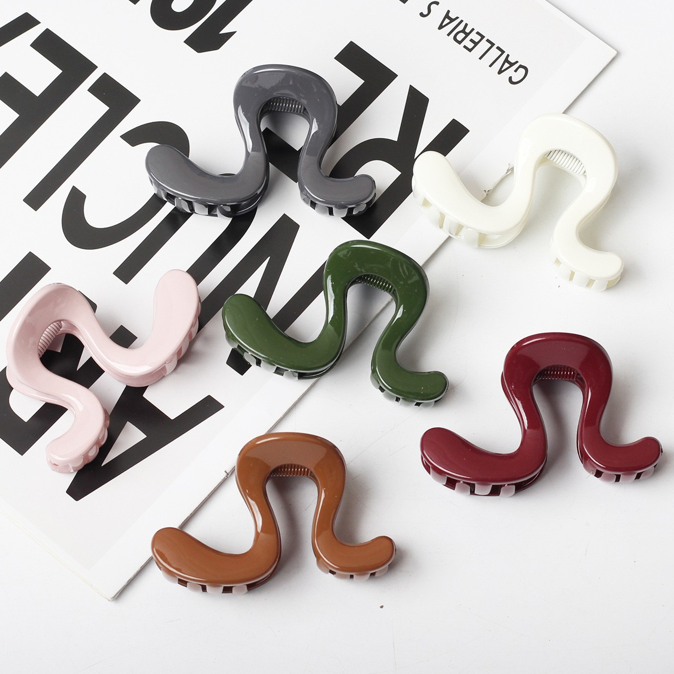 Diseño simple sensación de agarración de palabras grandes, cola de caballo alta fijación artefacto clip de cabello relajado, disco de cabello detrás del cerebro clip de pescado