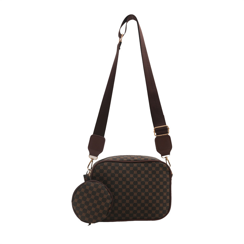 2024 nueva moda simple retro bolso impreso de mujer extranjero ancho cinturón de hombro bolso de hombro casual bolso de mochila