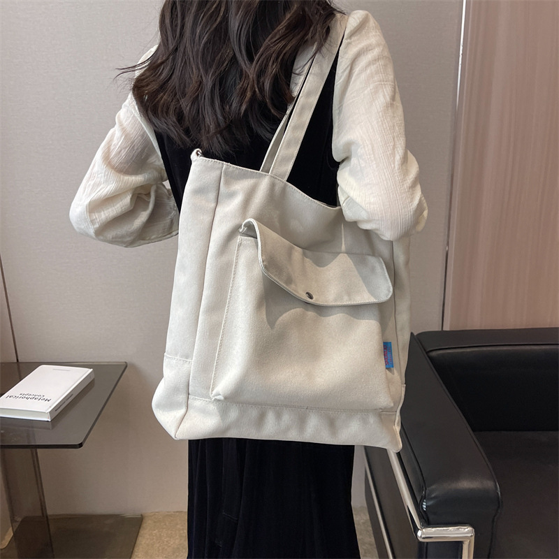 Los fabricantes venden al por mayor el nuevo bolso Tote para mujer bolso de lona de color sólido de gran capacidad bolso de mensajero de hombro casual de moda simple