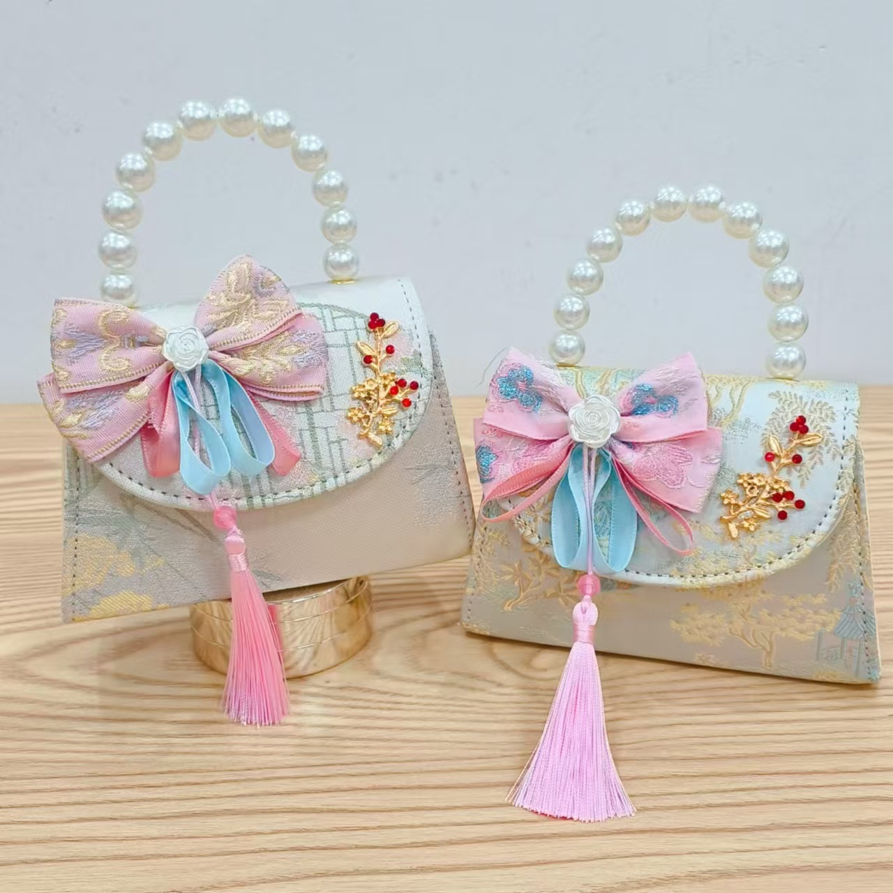 Niños pequeños bolsos de hombro de viento de fragancia de alta calidad exquisita niña antigua bolso de cambio princesa perla bolso de mano