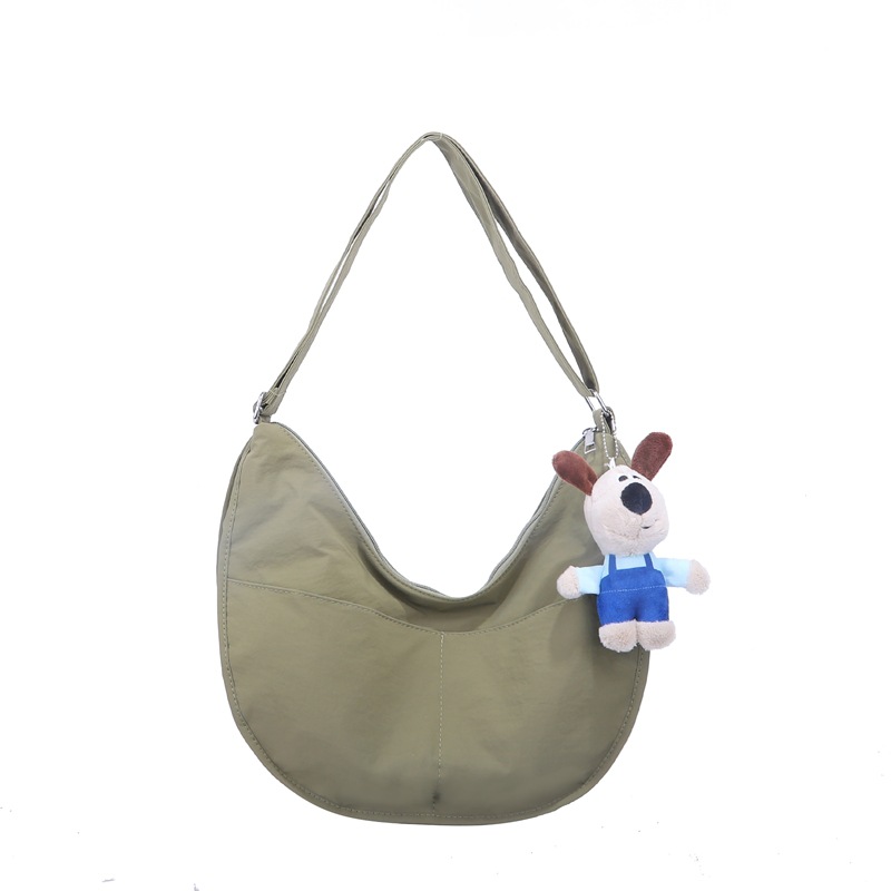 Bolsa de hombro coreana para niños y niñas de color sólido de gran capacidad bolsas de饺os para niños 2025 nuevas bolsas para niños con colgantes