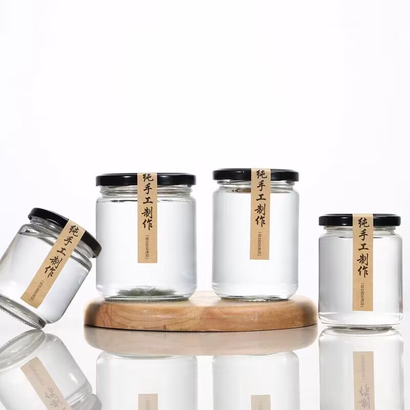 圆形酱菜玻璃瓶透明蜂蜜果酱密封储物罐辣椒酱罐头瓶带盖厂家货源