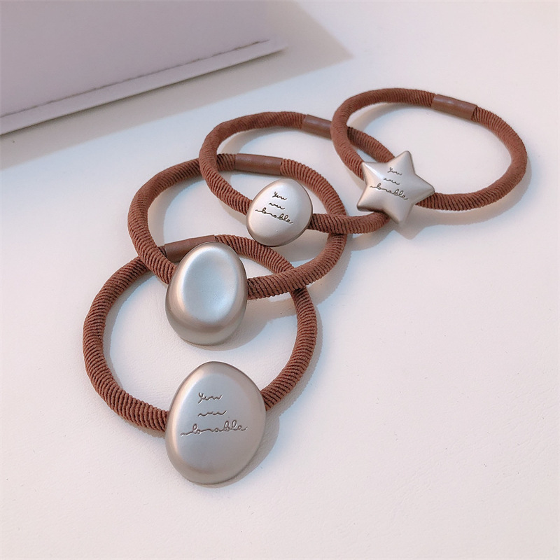Estrellas metálicas irregulares anillo de cabello temperamento joven de alta elástica cola de caballo cuerda simple banda de goma adornos de cabello